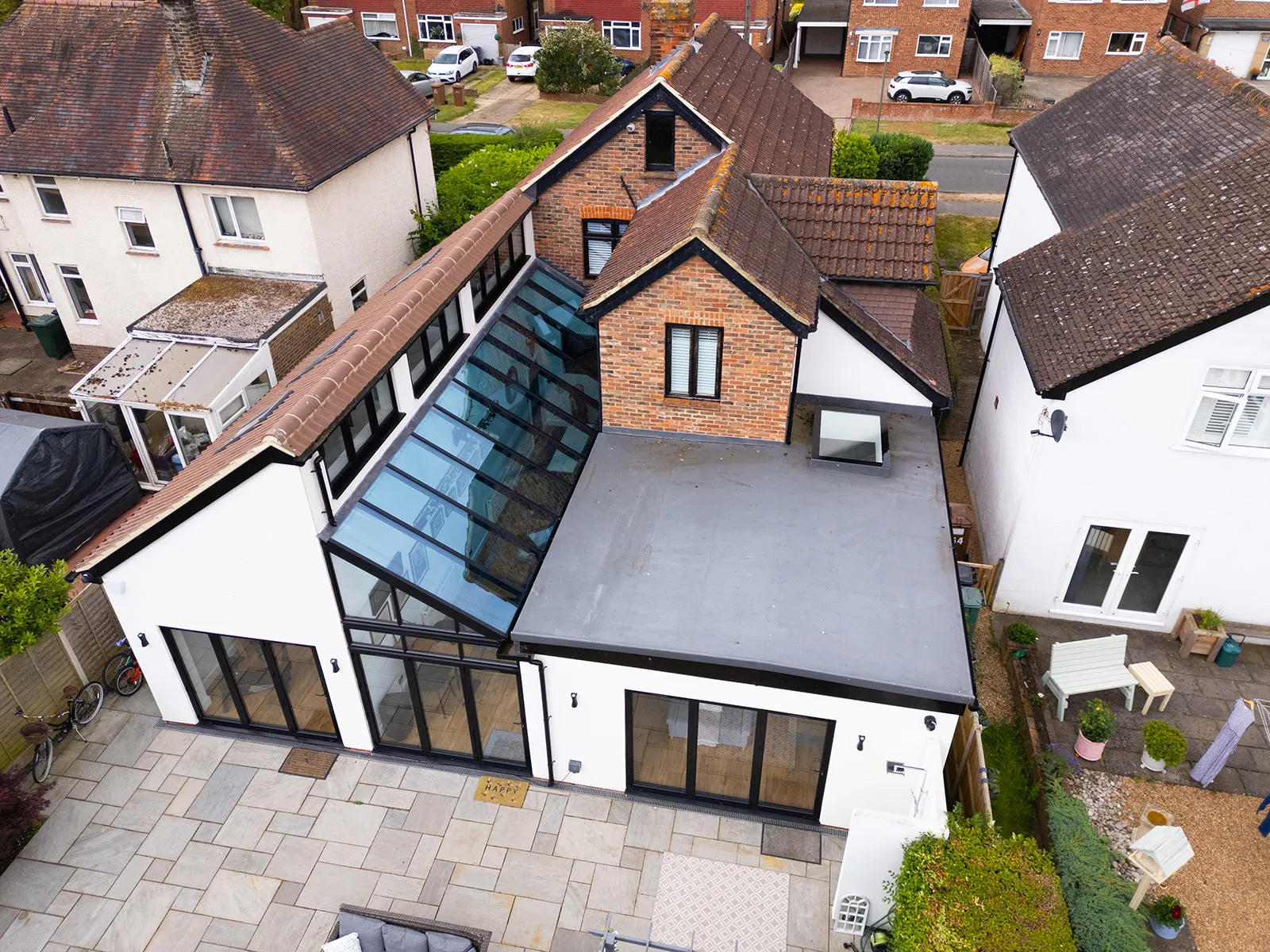 An aerial view of a house with a glass roof.
